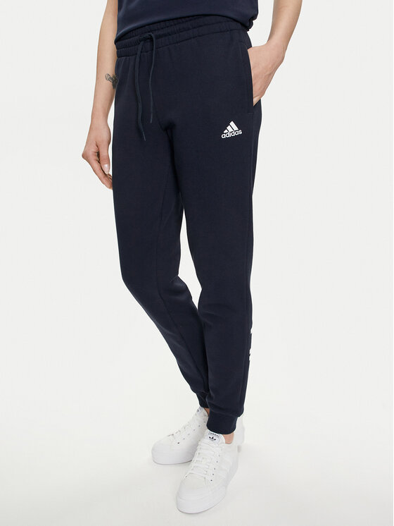 adidas adidas Spodnji del trenirke Essentials Linear IC6869 Mornarsko modra Slim Fit