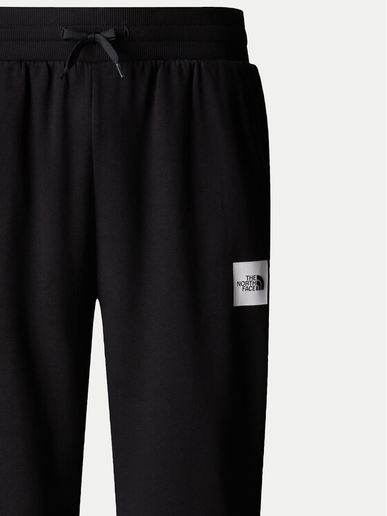 The North Face The North Face Долнище анцуг Fine NF0A8C1K Черен Tapered Fit
