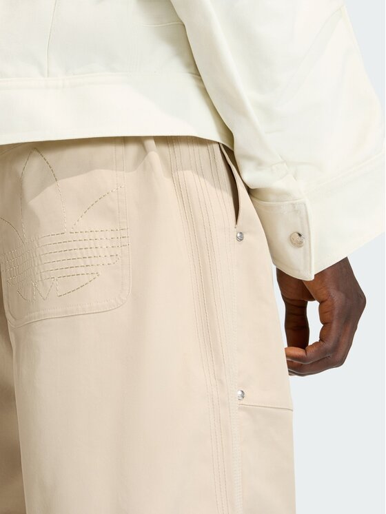 adidas adidas Spodnie materiałowe PREMIUM ESSENTIALS WIDE Beżowy Loose Fit