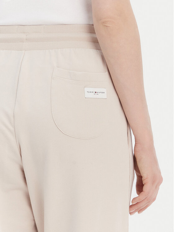 Tommy Hilfiger Tommy Hilfiger Долнище анцуг UW0UW04771 Бежов Relaxed Fit