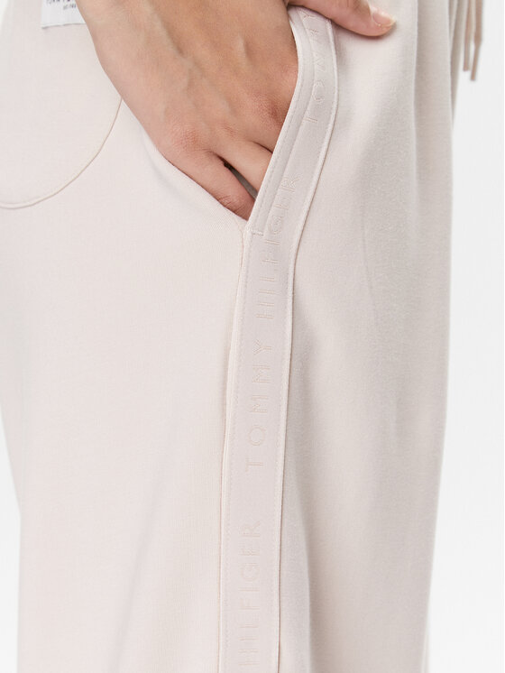 Tommy Hilfiger Tommy Hilfiger Долнище анцуг UW0UW04771 Бежов Relaxed Fit