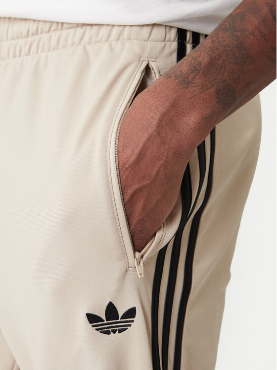 adidas adidas Sporta bikses Firebird KE6679 Bēšs Loose Fit