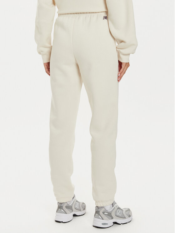 New Balance New Balance Pantaloni trening WP43500 Bej Relaxed Fit