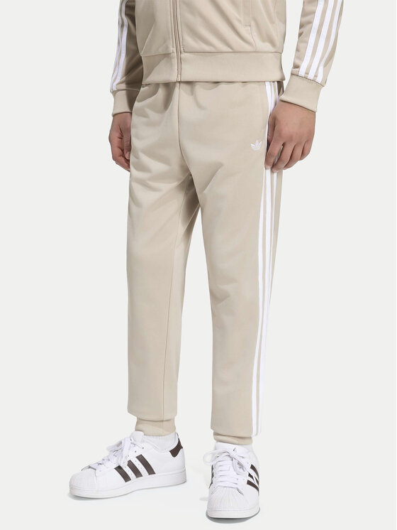 adidas adidas Спортивні штани Sst Track IA2239 Світло-бежевий Regular Fit