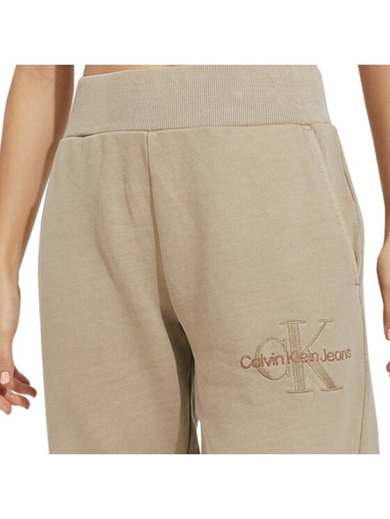 Calvin Klein Jeans Calvin Klein Jeans Teplákové kalhoty REGULAR Béžová Regular Fit