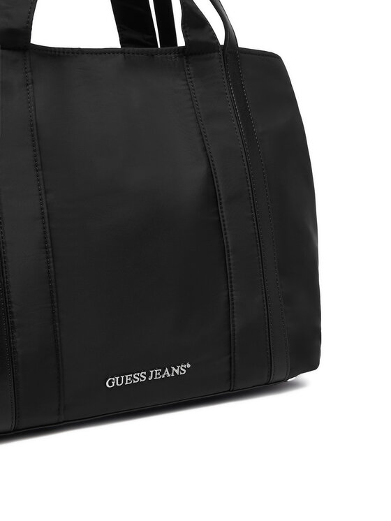 Zbliżenie na dolną część torebki shopper z przodu.