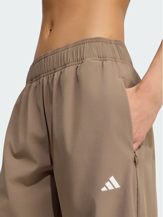 adidas adidas Spodnie materiałowe 156079 Beżowy Loose Fit