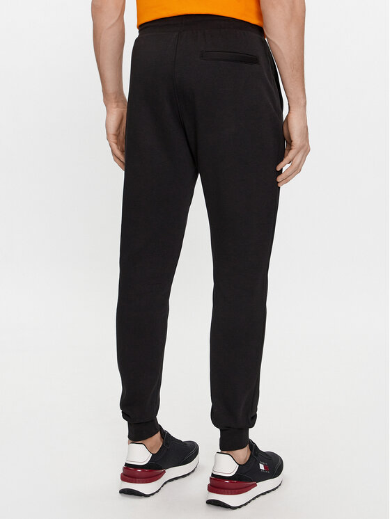 Tommy Hilfiger Tommy Hilfiger Долнище анцуг Flag Logo MW0MW36142 Черен Relaxed Fit