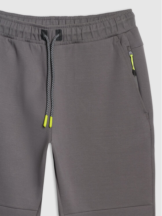 4F 4F Spodnie dresowe SIMPLE UTILITY Szary ciemny Regular Fit