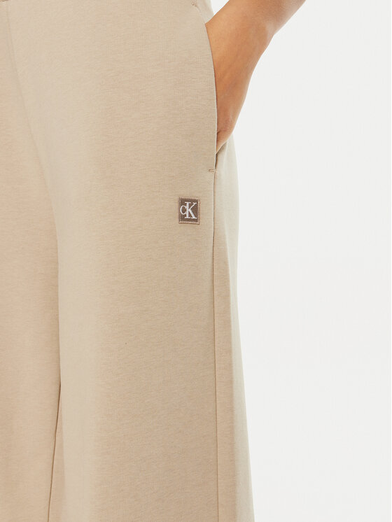 Calvin Klein Jeans Calvin Klein Jeans Spodnie dresowe J20J222597 Beżowy Relaxed Fit