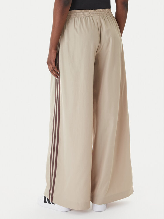 adidas adidas Teplákové nohavice Firebird Adilenium KD6300 Béžová Regular Fit