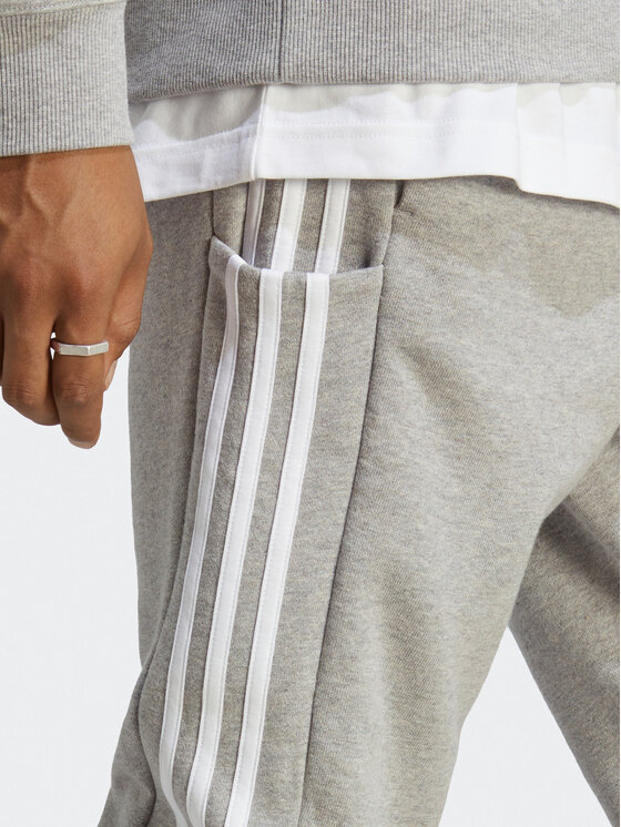 adidas adidas Melegítő alsó Essentials French Terry Tapered Cuff 3-Stripes Joggers IC9407 Szürke Regular Fit