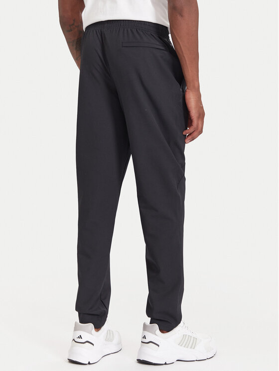 Under Armour Under Armour Sportinės kelnės Unstoppable 6003861 Juoda Loose Fit