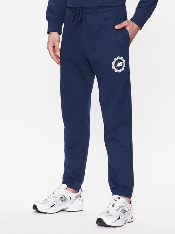 New Balance Spodnji del trenirke MP31902 Mornarsko modra Regular Fit