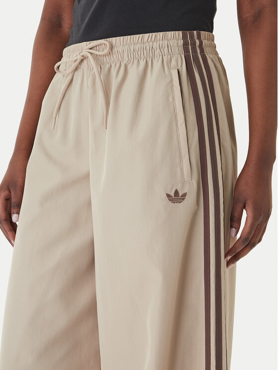 adidas adidas Παντελόνι φόρμας Firebird Adilenium KD6300 Μπεζ Regular Fit