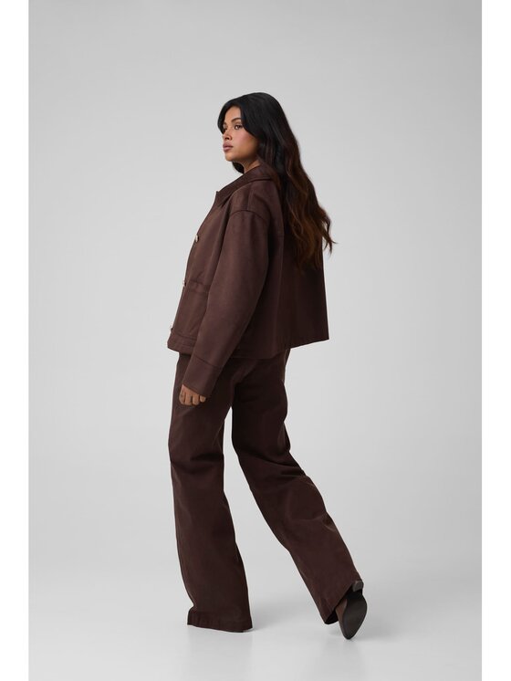 Guess Guess Bunda pro přechodné období 183553 Hnědá Classic Fit