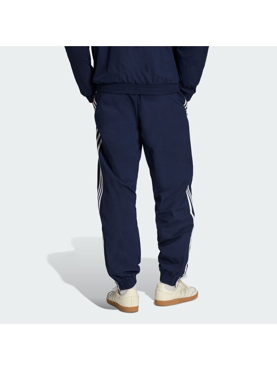 adidas adidas Spodnie dresowe FIREBIRD WOVEN Błękitny Regular Fit