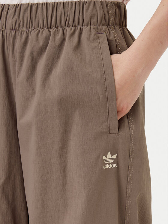 adidas adidas Donji dio trenerke Essentials Ripstop JD0783 Bež Loose Fit
