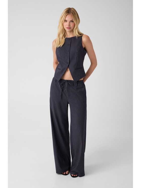 Guess Guess Spodnie materiałowe 183483 Niebieski Slim Fit