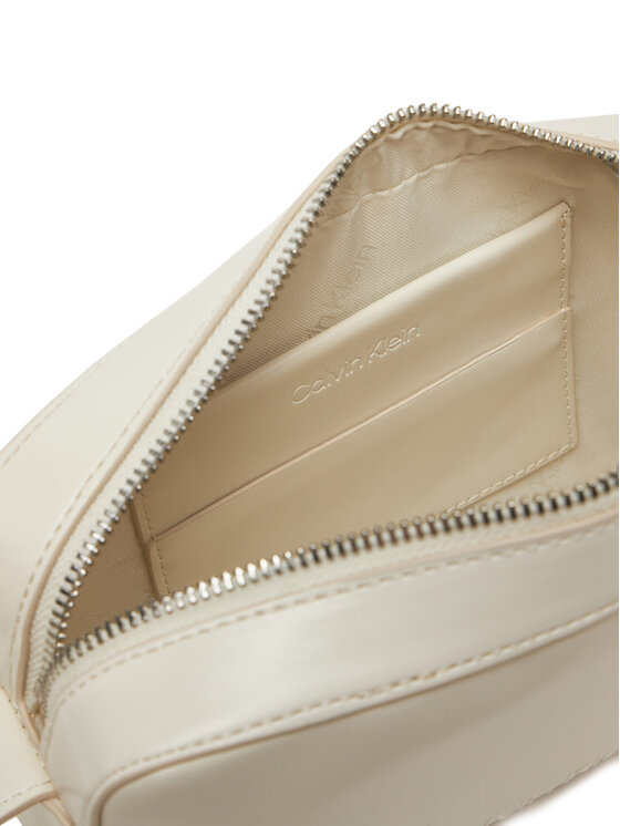 Calvin Klein Calvin Klein Torebka Embossed Logo Camera Bag K60K612555 Beżowy