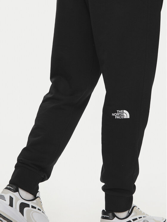 The North Face The North Face Donji dio trenerke Nse Light NF0A4T1F Crna Regular Fit