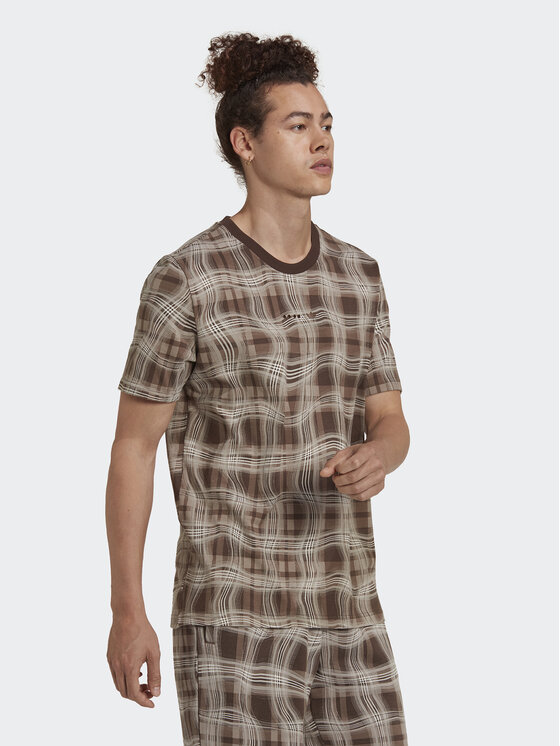 adidas adidas T-Shirt Reveal Allover Print HK2744 Brązowy Regular Fit