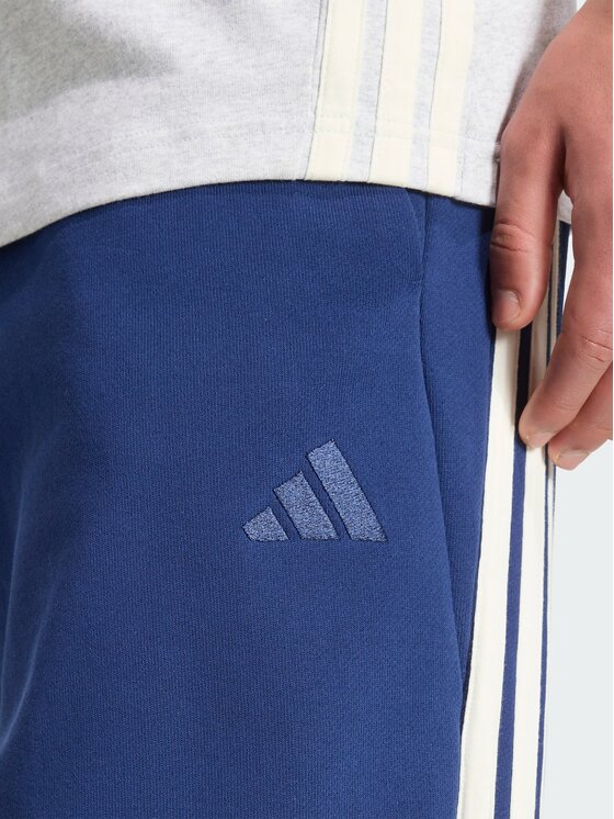 adidas adidas Spodnie materiałowe 167693 Niebieski Loose Fit