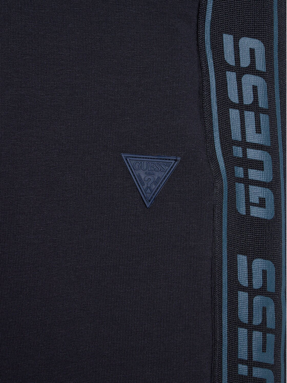 Guess Guess Spodnie dresowe L2RQ15 K6ZS1 Granatowy Regular Fit
