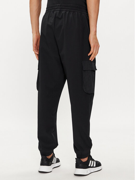 adidas adidas Pantaloni da tuta City Escape IR5179 Nero Regular Fit