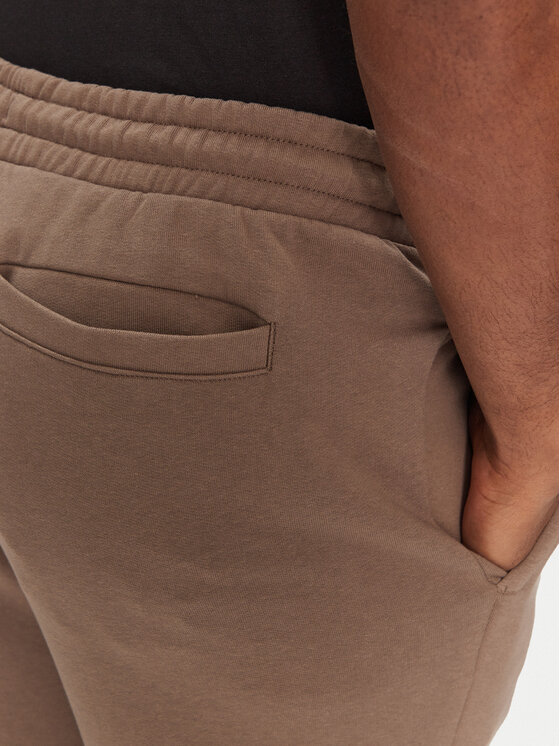 Puma Puma Donji dio trenerke Ess 629651 Smeđa Relaxed Fit