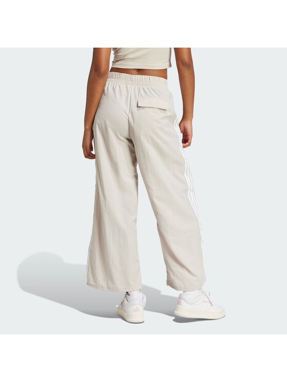 adidas adidas Sporta bikses Essentials 3-Stripes JC8168 Bēšs Loose Fit