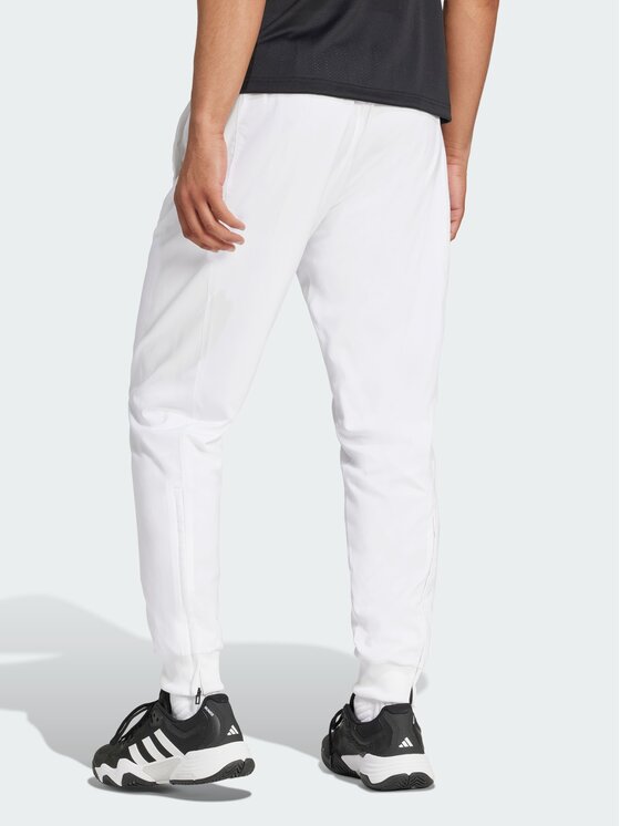 adidas adidas Spodnie materiałowe Tennis Walk-On Biały Regular Fit