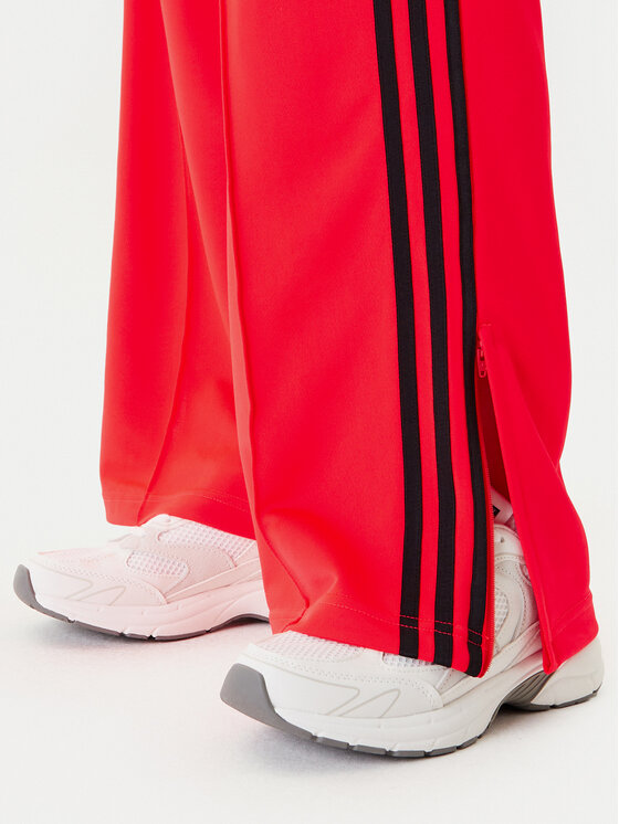 adidas adidas Спортивні штани adicolor Classic Firebird JW1227 Оранжевий Loose Fit