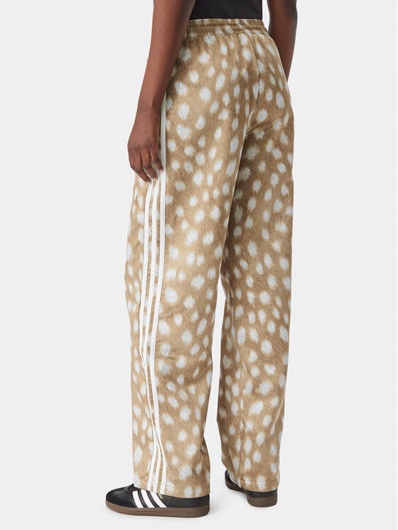 adidas adidas Spodnie dresowe Firebird KT2144 Brązowy jasny Wide Leg