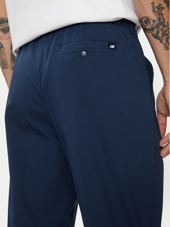 New Balance New Balance Pantaloni di tessuto Athletics Standard MP43554NNY Blu scuro Regular Fit