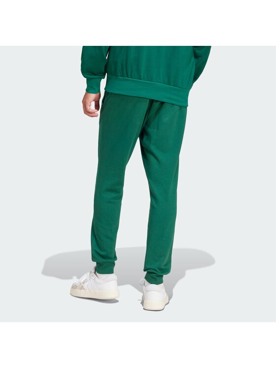 adidas adidas Spodnji del trenirke Essentials Feel Cozy JE3858 Zelena Regular Fit