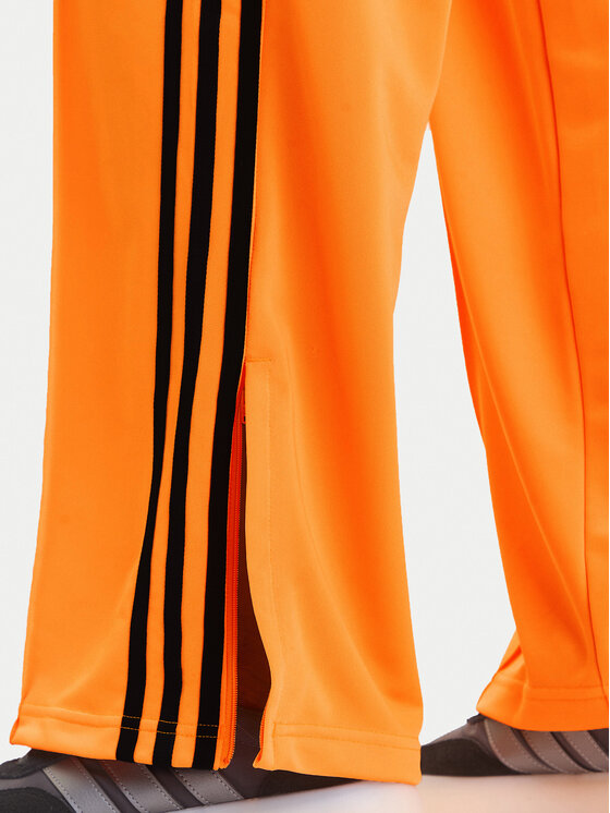 adidas adidas Долнище анцуг adicolor Classic Firebird JY2694 Жълт Loose Fit