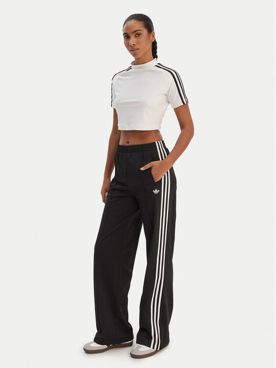 adidas adidas Παντελόνι φόρμας Firebird KD7976 Μαύρο Loose Fit