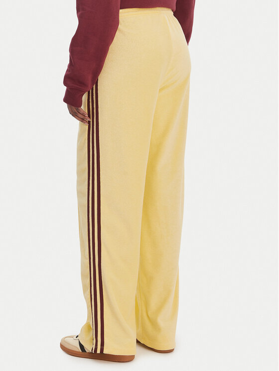 adidas adidas Spodnie dresowe Terry Towel Firebird KQ6662 Żółty Loose Fit