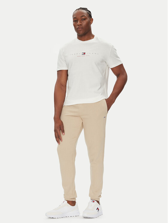 Tommy Jeans Tommy Jeans Spodnie dresowe Flag DM0DM20473 Beżowy Slim Fit