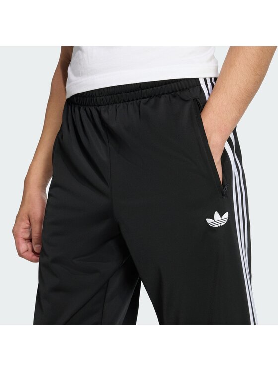 adidas adidas Долнище анцуг Firebird KD8315 Черен Loose Fit
