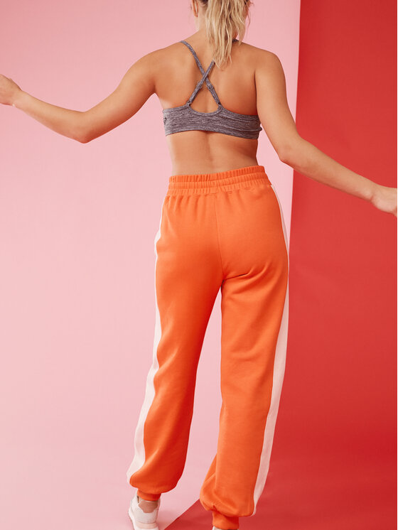 Roxy Roxy Teplákové nohavice Ess Nrj Cbk Jog Otlr ERJFB03366 Oranžová Regular Fit