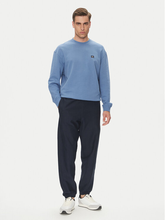 Calvin Klein Jeans Calvin Klein Jeans Teplákové kalhoty Premium LV04RC279G Tmavomodrá Regular Fit