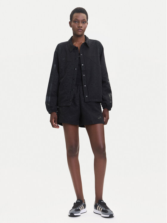 adidas adidas Преходно яке Tiro x Common Goal Coaches JL7647 Черен Loose Fit