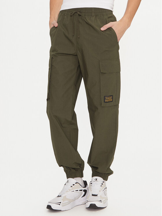 Champion Pantaloni da tuta 220415 Verde Loose Fit Modivo