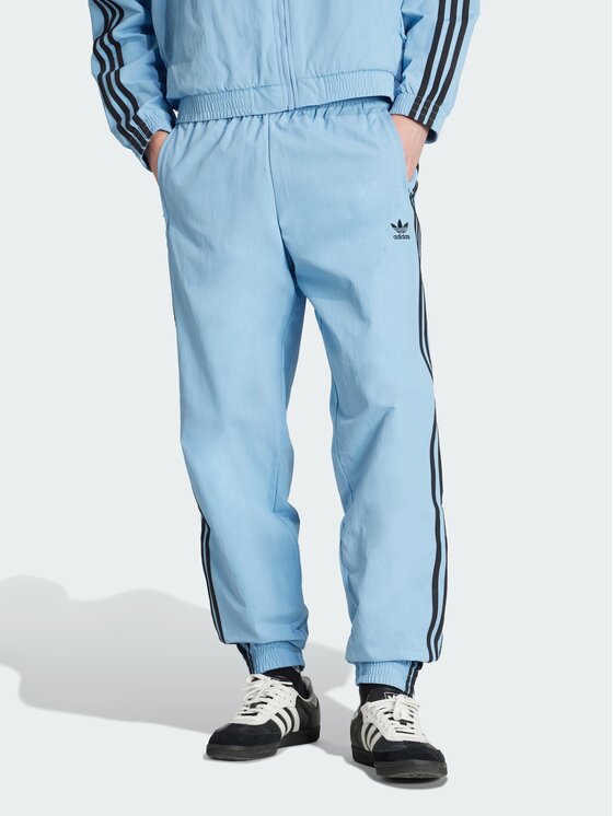 adidas adidas Spodnie dresowe Adicolor Woven Firebird Błękitny Regular Fit