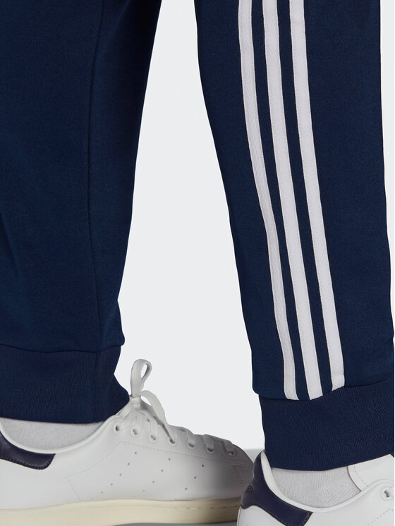 adidas adidas Спортивні штани ADICOLOR CLASSICS PRIMEBLUE SST Tracksuit Bottom HK7353 Голубий Slim Fit