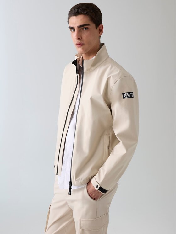 Guess Guess Bunda pro přechodné období 182467 Béžová Classic Fit