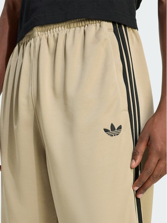 adidas adidas Spodnie dresowe ADICOLOR LOOSE Beżowy Loose Fit