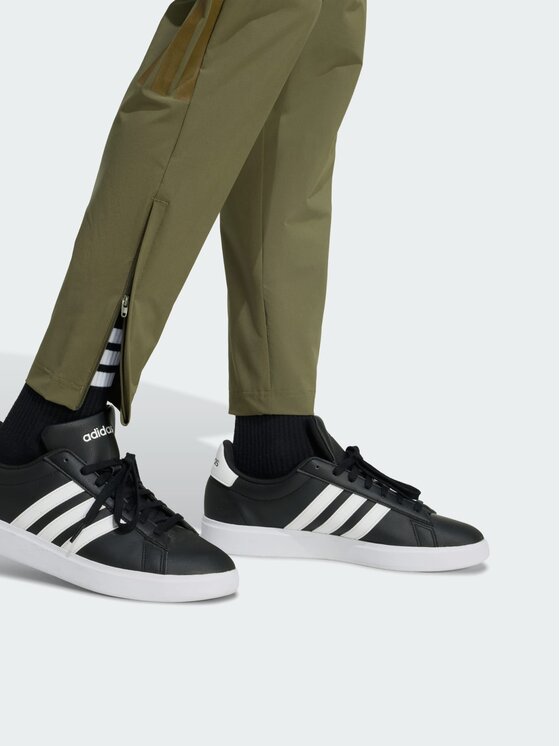adidas adidas Spodnie materiałowe 158889 Zielony Slim Fit